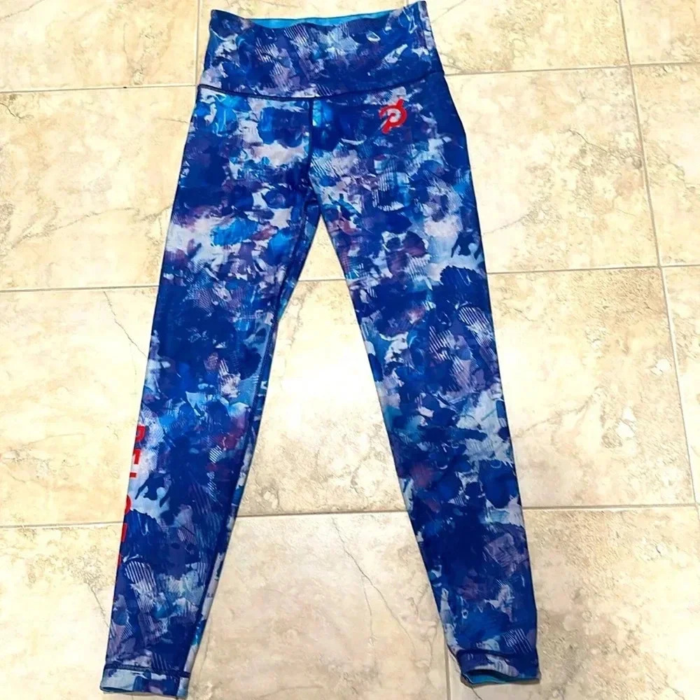 Peloton reversable leggings purple blue. Size M